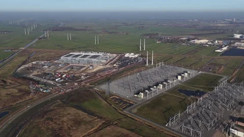 Aerial drone footage of a Google data center under construction in Westpoort 動画素材 328296771