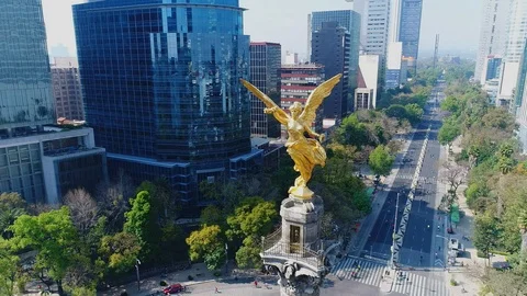 Aerial drone footage of the Independence Monument in Mexico City showing Stock Footage