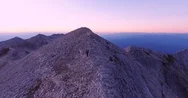 Aerial Drone Footage Of Man Hiking On Top Of Mountain Sunset Adventure Nature Stock Footage