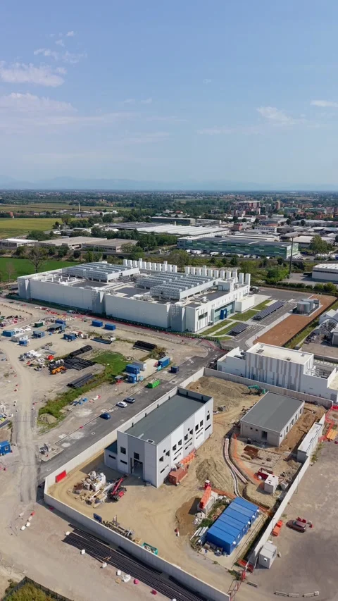 Aerial drone footage of a modern data center near Milan, Melegnano showing Stock Footage 344951665