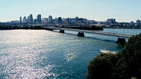 Aerial drone footage of montreal with bridges and skyscrapers in the backgrou Stock Footage
