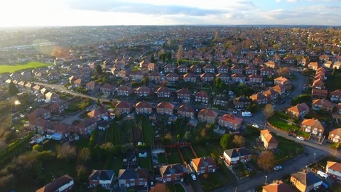 Aerial drone footage over a British council housing estate, UK houses and homes Stock Footage