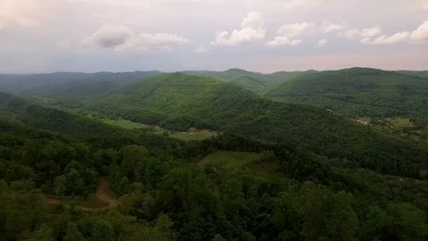 Aerial drone footage over a stunning valley and hills in Kentucky just north of Stock Footage