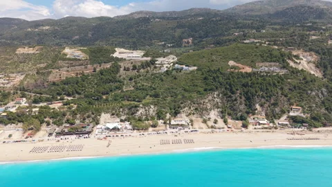Aerial drone footage pulling back from the coastline of Lefkada Island Stock-Footage 336468429