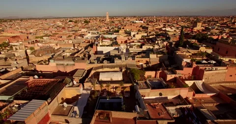 Aerial drone footage of residential district against sky, Marrakesh, Morocco Stock Footage