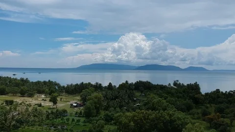 Aerial drone-footage of rice-fields and the sea in Cambodia (original version) Stock Footage