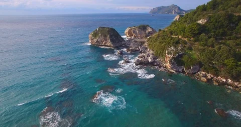 Aerial drone footage of rocks and the sea at Corfu Greece Stock Footage