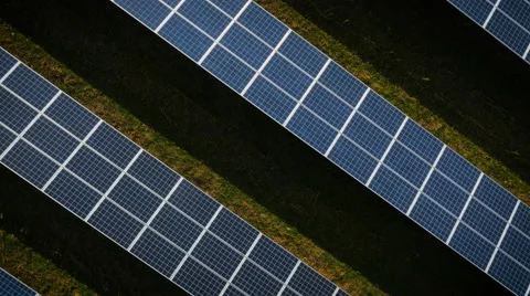 Aerial drone footage spinning over UK solar panels Stock Footage 62199455