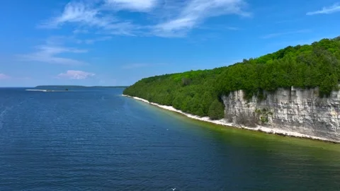 Aerial drone footage of striking limestone cliffs in Fayette, Michigan Stock Footage 285876053
