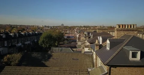 Aerial Drone footage sweeping over North London on a sunny day. Stock Footage