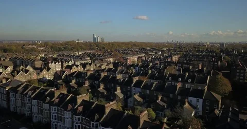Aerial Drone footage sweeping over North London on a sunny day. Stock Footage 82390538