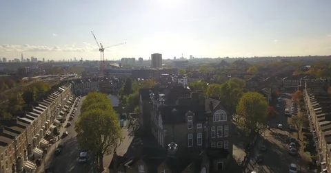Aerial Drone footage sweeping over North London on a sunny day. Stock Footage