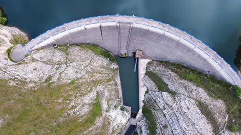 Aerial drone footage top view Water dam and reservoir lake, generating hydro Stock Footage