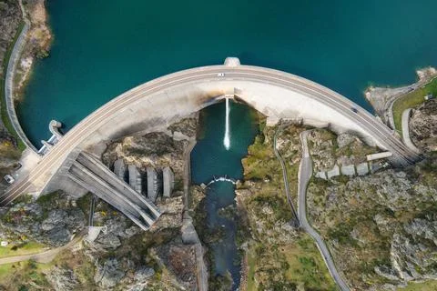 Aerial drone footage top view Water dam and reservoir lake, generating hydro Stock Photos
