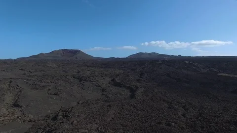 Aerial drone footage of volcano land near Timanfaya National park Stock Footage