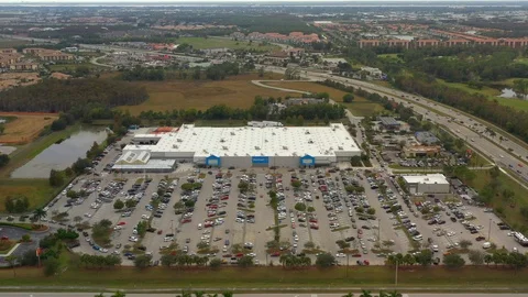 Aerial drone footage Walmart Supercenter Fort Myers Florida USA Stock Footage