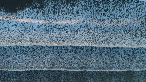 Aerial Drone Footage Of Waves Breaking On Shore Stock Footage
