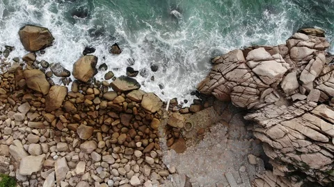 Aerial Drone Footage of Waves Crashing on Rocks Stock Footage