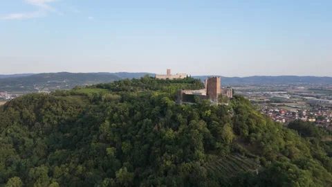 Aerial drone forward flight and rising over medieval castles in Italy Stock Footage 342536819