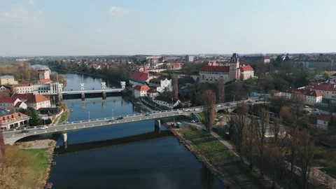 Aerial drone forward flight over Elbe river with road bridge and Brandýs castle Stock Footage 331099021
