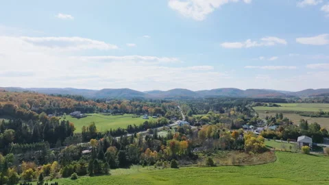 Aerial Drone Forward Motion Over Rural Valley and Autumn Farmland Stock Footage 321377614