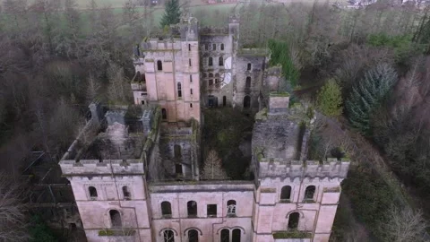 Aerial drone forward pass over Lennox Castle in Scotland 動画素材 308791242