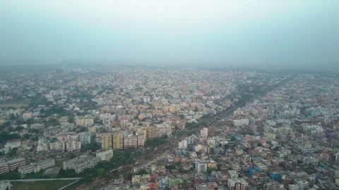 Aerial Drone Forward Shot Over Dense Patna India Cityscape Hazy Sky Vidéo 336101775