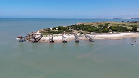 Aerial Drone Forward tracking shot of traditional wooden fishing hut on stilts 2 Video stock 316053741
