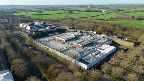 Aerial drone glide over a large-scale data storage facility highlighting the Stock Footage 333938163