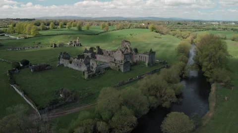 Aerial drone gliding over ancient Athassel Abbey ruins in Tipperary, Irelan.. Stock Footage 341348334