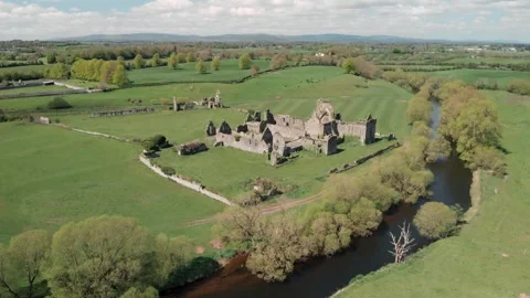 Aerial drone gliding over ancient Athassel Abbey ruins in Tipperary, Irelan.. Stock Footage 341348361