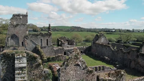 Aerial drone gliding over ancient Athassel Abbey ruins in Tipperary, Irelan.. Stock Footage 341348417