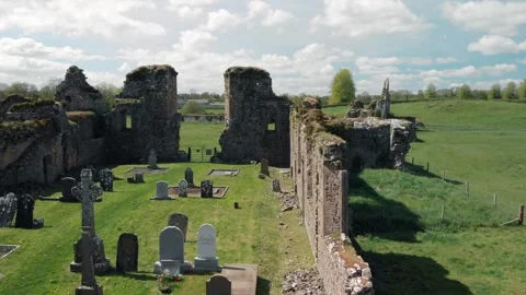 Aerial drone gliding over ancient stone ruins of Athassel Abbey in Tipperar.. Stock Footage 341348528