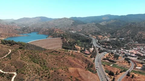 Aerial drone gliding over Embalse del Limonero reservoir dam in Malaga, Spa.. Stock Footage 340918172
