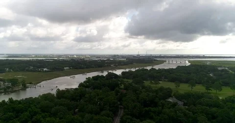 Aerial drone Golf Course on the River Near the Toll Bridge Charleston, SC Stock Footage 77012463