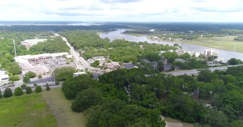 Aerial drone Golf Course on the River Near the Toll Bridge Charleston, SC Stock Footage 77012620