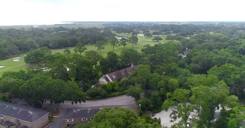 Aerial drone Golf Course on the River Near the Toll Bridge Charleston, SC Stock Footage 77012703