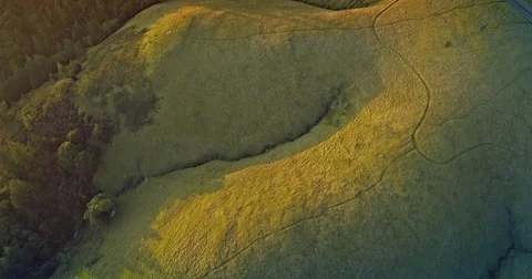 Aerial Drone of grass hills on a mountain ridge at sunset, san francisco Stock Footage