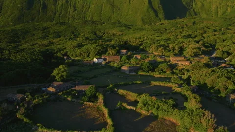 Aerial drone high-angle view of traditional stone houses with terracotta roofs 動画素材 335706625