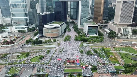 Aerial Drone High Left to Right Hong Kong Pro-Police Rally 스톡 동영상 111933691