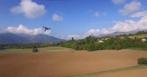 Aerial of drone hovering over beautiful landscape Stock Footage 64344825