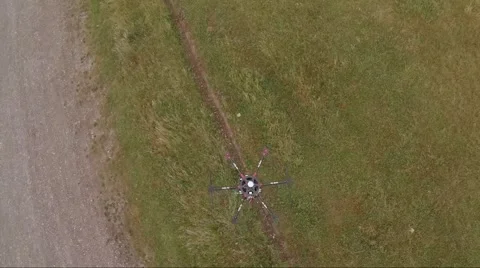 Aerial of drone hovering over green lawn 스톡 동영상 64723708