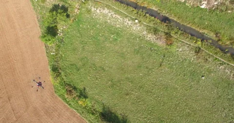 Aerial of drone hovering over landscape 스톡 동영상 64344850