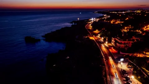 Aerial drone hyper lapse of highway in Cascais, Portugal at night  Stock Footage 252454024