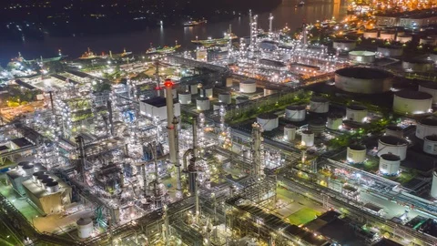 Aerial drone hyper lapse over oil refinery factory at night. Stock Footage 109145694