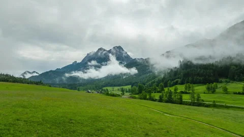 Aerial drone hyperlapse of Gesause national park Austria with low hanging clouds Stock Footage 278213788
