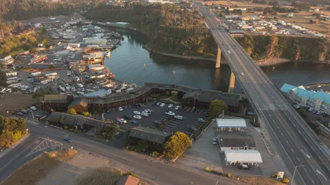 Aerial drone hyperlapse over highway and stores town - day timelapse Stock Footage 220527234
