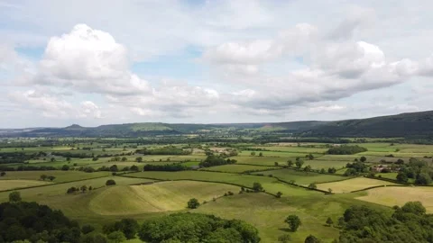 Aerial drone hyperlapse over patchwork fields in the Yorkshire Moors Video stock 159769596