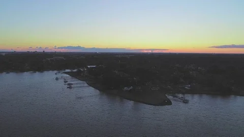 Aerial (drone) hyperlapse of a sunrise over Portsmouth Virginia Stock Footage 120884010