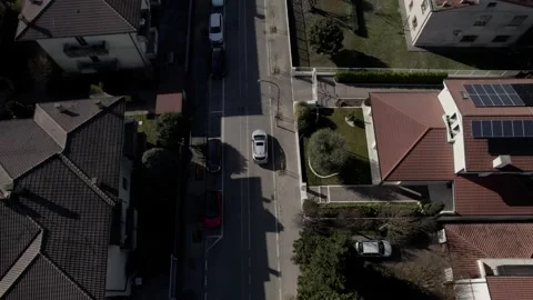 Aerial drone image of a small town in northern Italy. Houses, streets and cars. Stock Footage 170293858